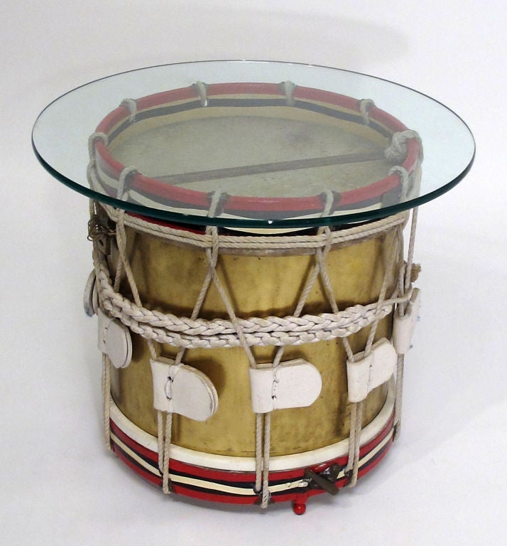 Brass drum with painted wood trim and glass top.