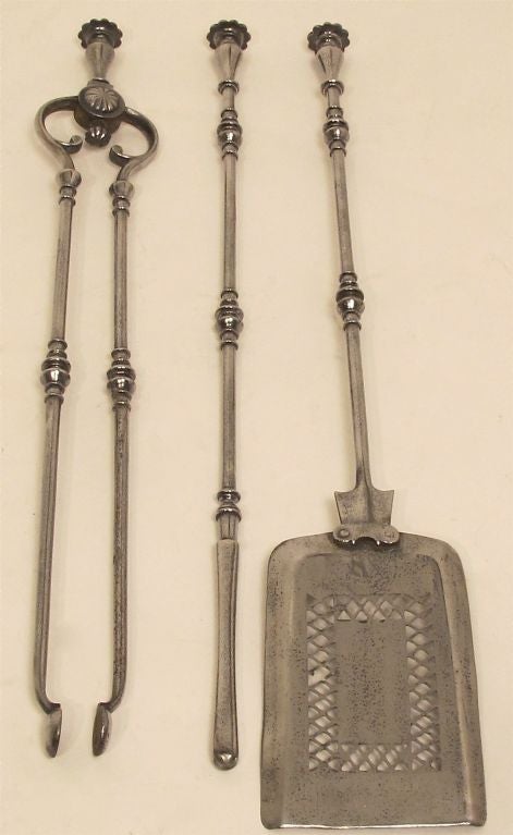 Set of three beautiful quality Georgian period burnished steel fireplace tools. England, early 19th century circa 1810.