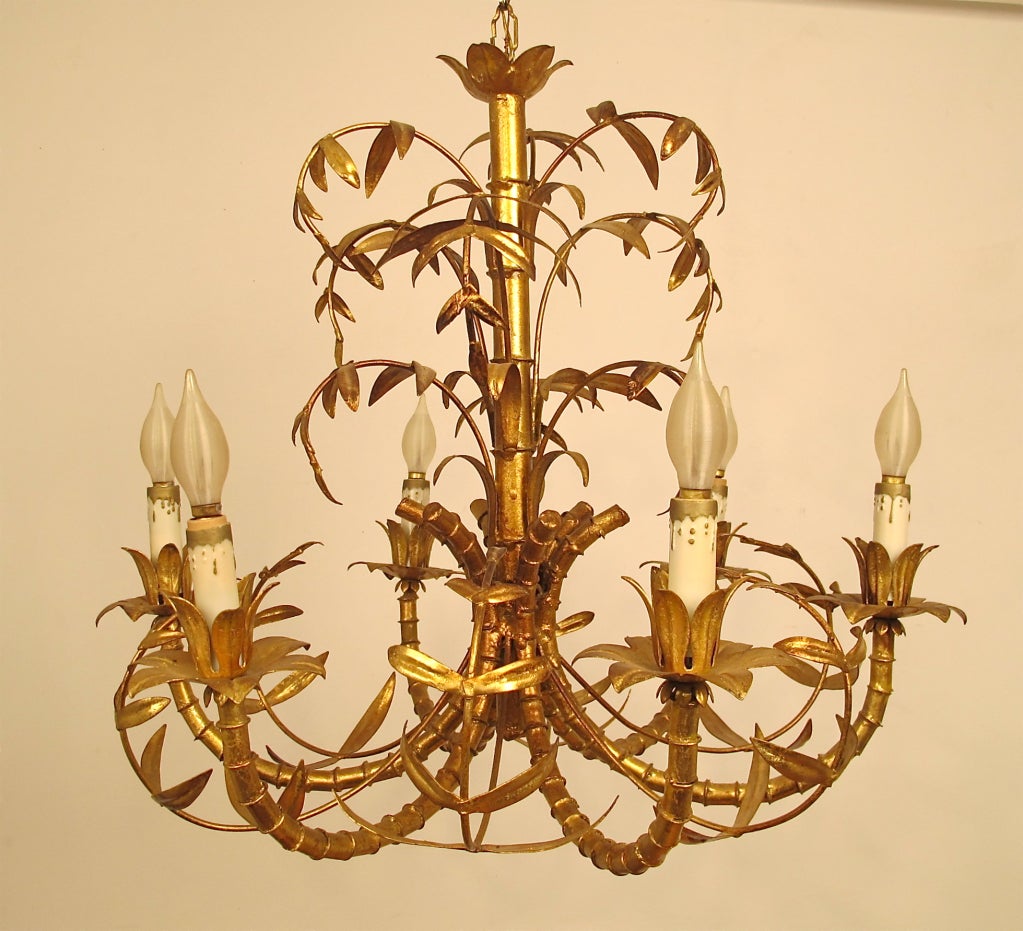 Six arm gilt faux bamboo chandelier. Includes chain and original canopy.