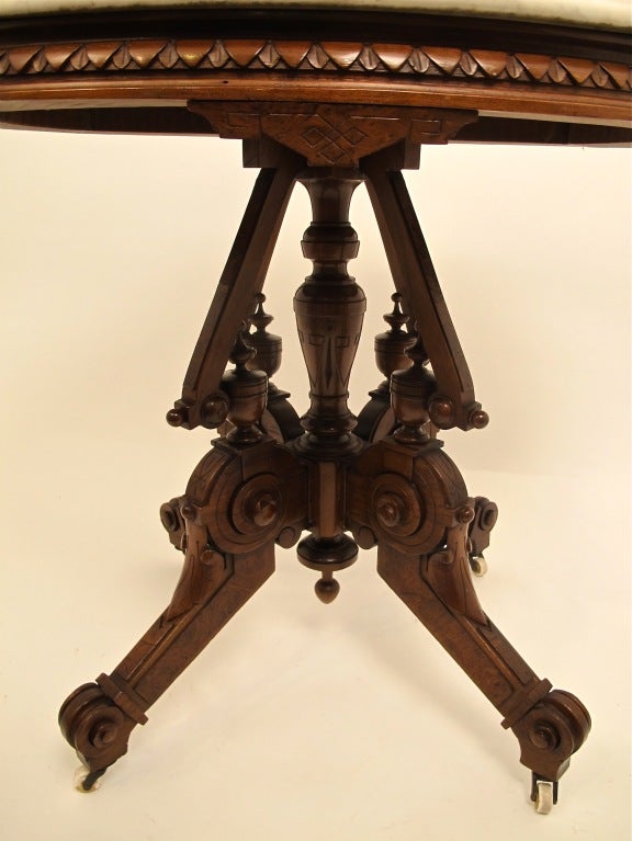 Beautifully made walnut center or lamp table with marble top.