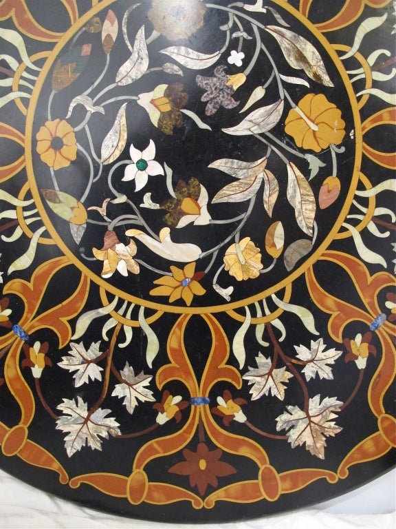 Spectacular and large Florentine style mixed stone specimen table top. Extremely fine inlaid stone detail work of a beautiful floral design. Italy, mid 20th century.