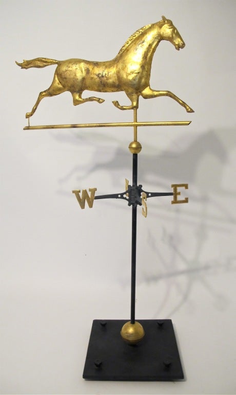 Large scale 19th century gilt horse weathervane on floor standing museum quality iron mount. Exceptional form and detail.
Provenance: Private collection, San Francisco
Measurements include the stand.