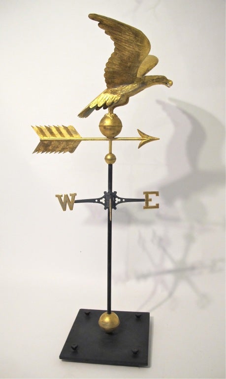 Large scale late 19th century gilt weathervane on floor standing museum quality iron mount. Exceptional form and detail.
Provenance: Private Collection, San Francisco
Measurements include the stand.