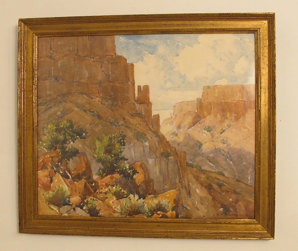 Watercolor painting of a south western landscape by California artist William Thomas McDermitt (1884-2004). Painted on paper and framed behind glass, in gilt wood frame.. American, mid 20th century circa 1930.