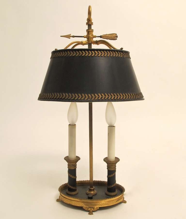 An exceptionally good quality gilt bronze table lamp with applied brass detail on tole metal shade. Recently- re-wired. French, late 19th century.