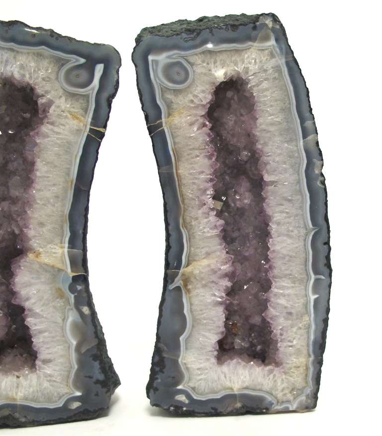 Two larger scale amethyst geodes.