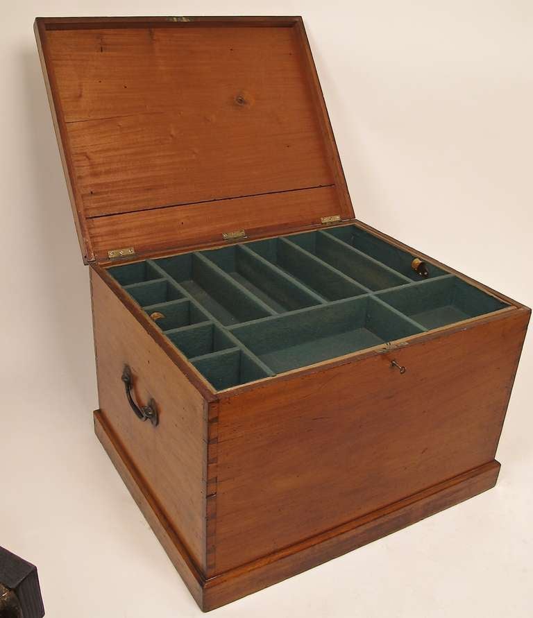 Teak wood silver chest with original felt lined fitted trays.