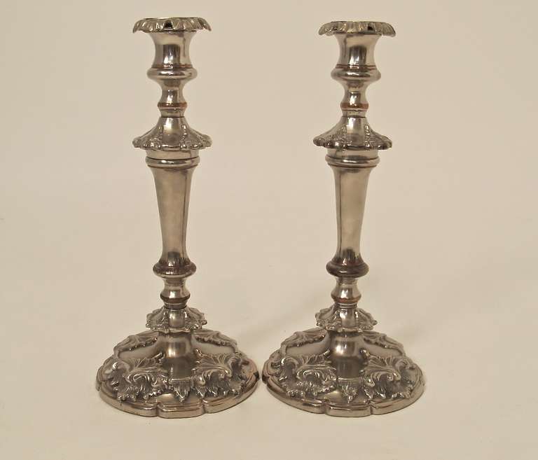 A pair of English Sheffield silver on copper candlesticks, 19th century.