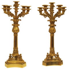 Coppia di candelabri Impero in bronzo dorato
