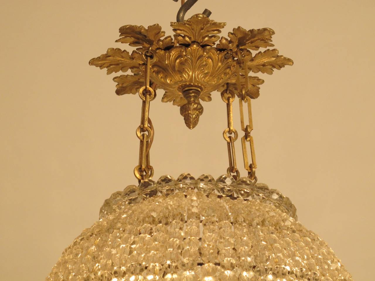Large beaded glass ball suspended from fancy leaf canopy. Newly re-wired. France, circa 1920's.