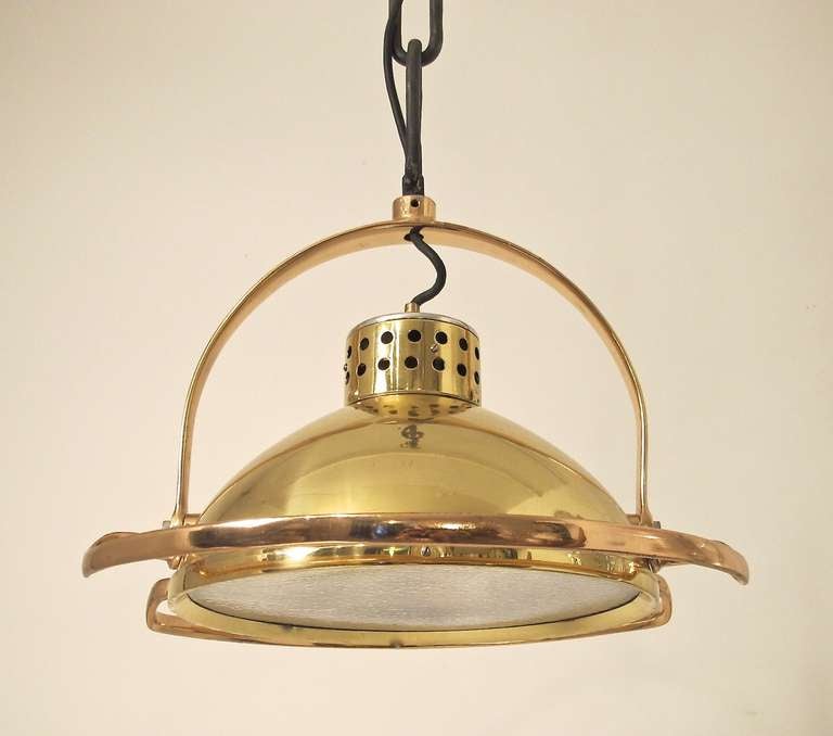 Surgical light converted to a hanging ceiling fixture. Fixture comes with 30