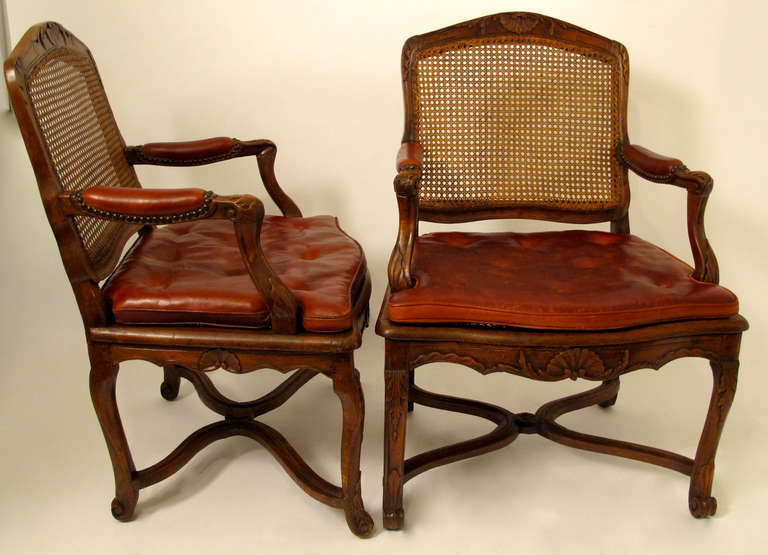 Polished Pair of French Regence Walnut Fauteuils Armchairs