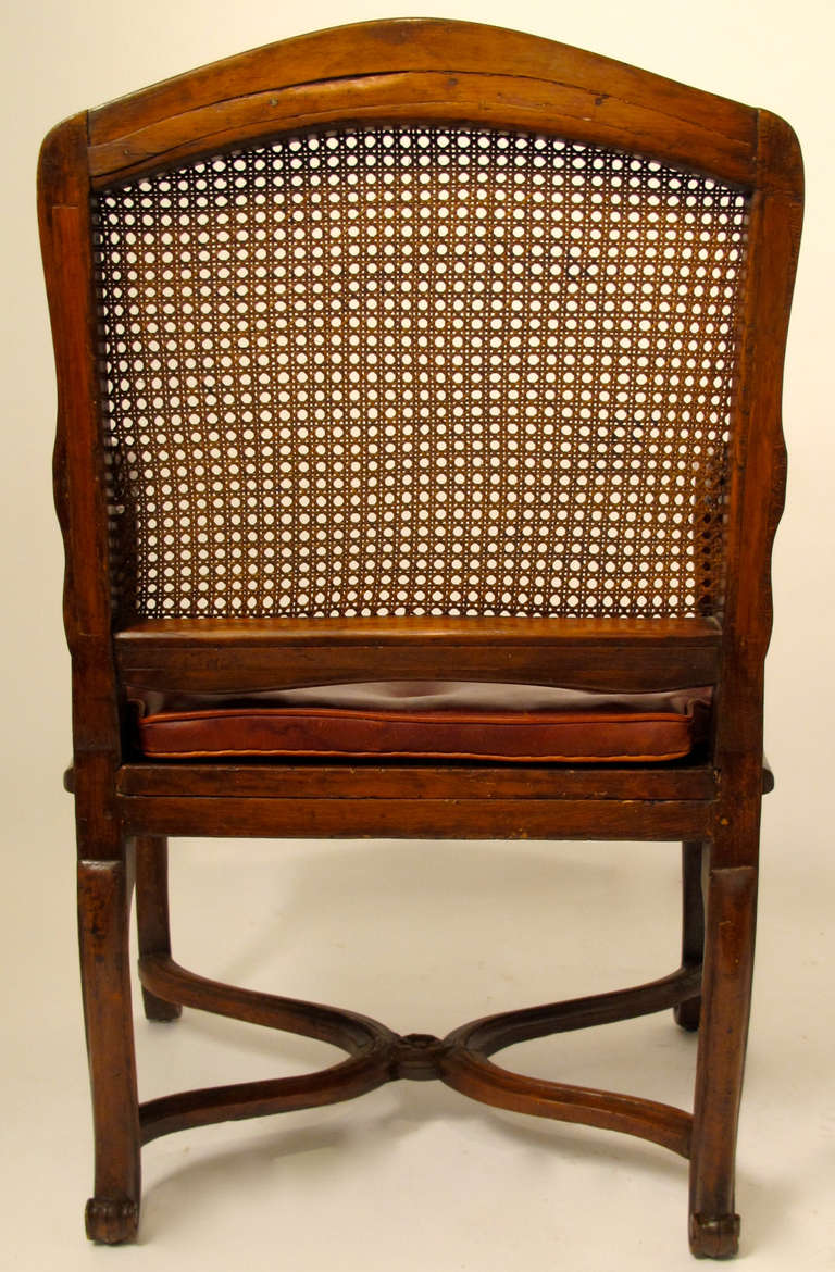 Cane Pair of French Regence Walnut Fauteuils Armchairs