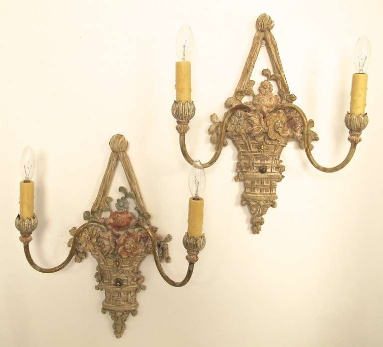 A pair of hand carved and painted two arm sconces. Newly re-wired. Italy, early 20th century, 1930's-1940's.