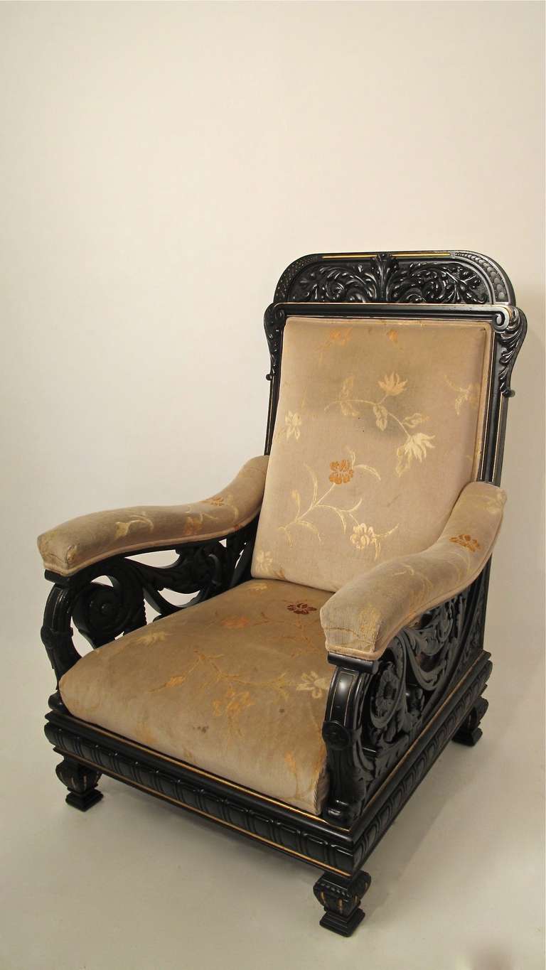 A fine pair of elaborately carved and ebonized cherrywood armchairs. Custom made for the James C. Flood estate Linden Towers in Menlo Park, California. Attributed to the noted New York furniture makers Pottier and Stymus.
Chairs are generous and