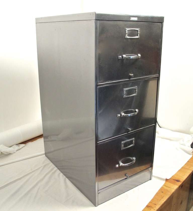 Three drawer stainless steel Steecase filing cabinet.