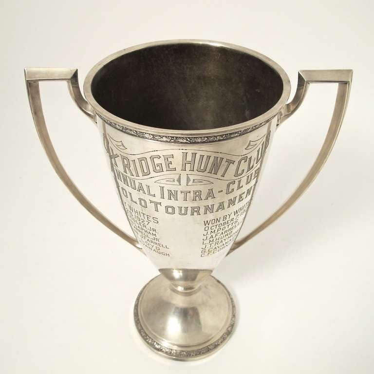 Very large and impressive sterling silver trophy or loving cup award. Reads: Oxridge Hunt Club, Annual Intra-Club Polo Tournament. Lists winners names and the years 1927 & 1928. Marked Gorham and sterling. Weighs 3.75 lbs.