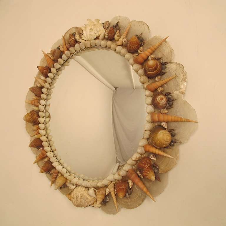Hand made seashell and convex mirror by California, Sonoma artist in the 1960's.
We have a matching mirror available as well, sold separately.