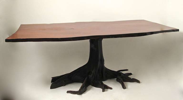 Unusual and impressive tree form dining table. High quality craftsmanship in the manner of George Nakashima. Please see our other listing for the companion  set of four dining chairs.