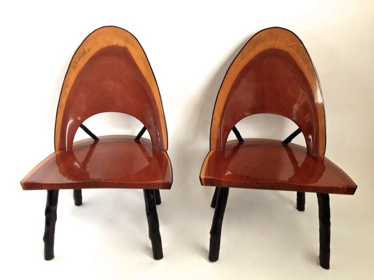 A set of four unique and custom-made, rustic dining or side chairs. High quality craftsmanship, beautifully made, and having a comfortable seat. Made in the USA the 
Early 20th century (1930s-1950s).
