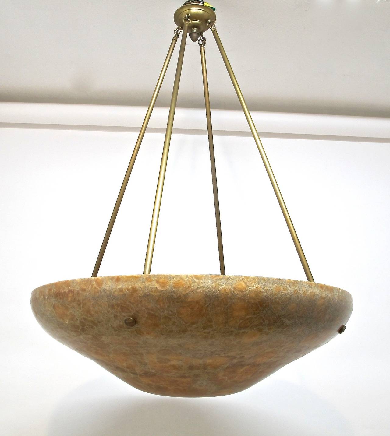 Large scale and dramatic amber colored alabaster bowl pendant light fixture. Newly re-wired.