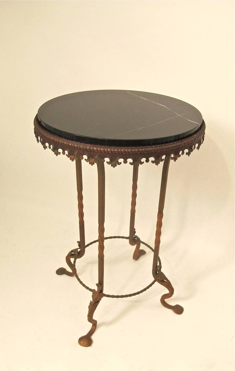 An attractive marble top side table with painted and gilt detail, in completely original condition. American, early 20th century.