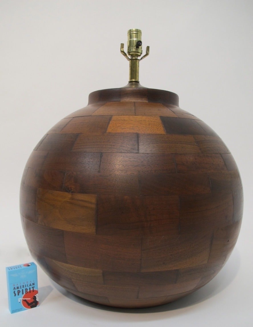 A very large handmade walnut round ball or orb shaped lamp.  Made from wood blocks.  One of a kind, American, Circa 1970's.
 
