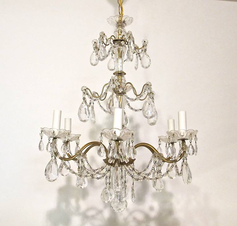 Small Italian chandelier with glass beaded swags and crystal pendants. The drop including the canopy and chain is 39
