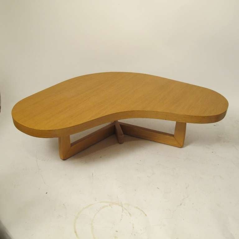 Boomerang shaped oak coffee table in original condition and with original finish. American, circa 1960.