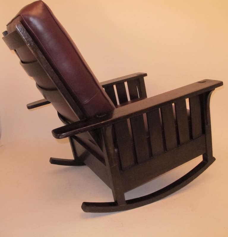 Genuine Stickley Bros. Arts & Crafts period rocker with new leather upholstery.