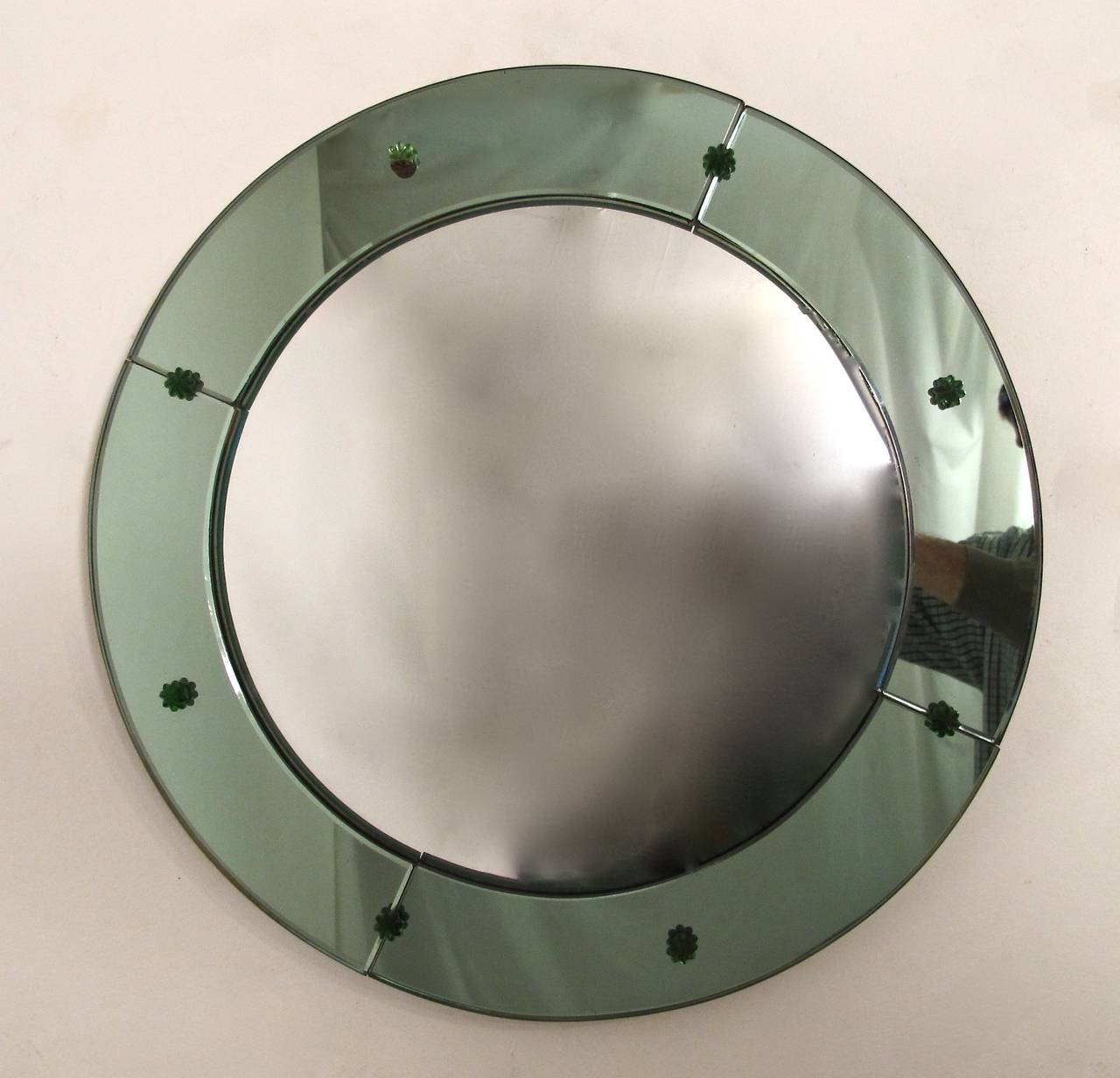 An unusual Art Deco period green glass frame with convex or fisheye mirror.