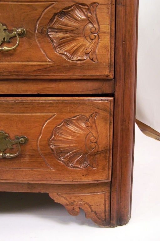 Carved 18th Century French Walnut Chest of Drawers For Sale