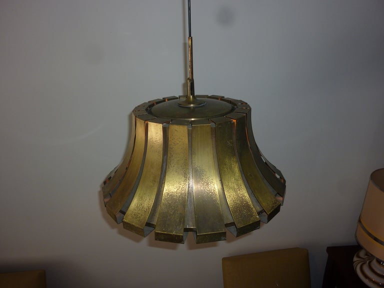 Elio Martinelli for Martinelli Luce chandelier. Tarnish brass and original condition.