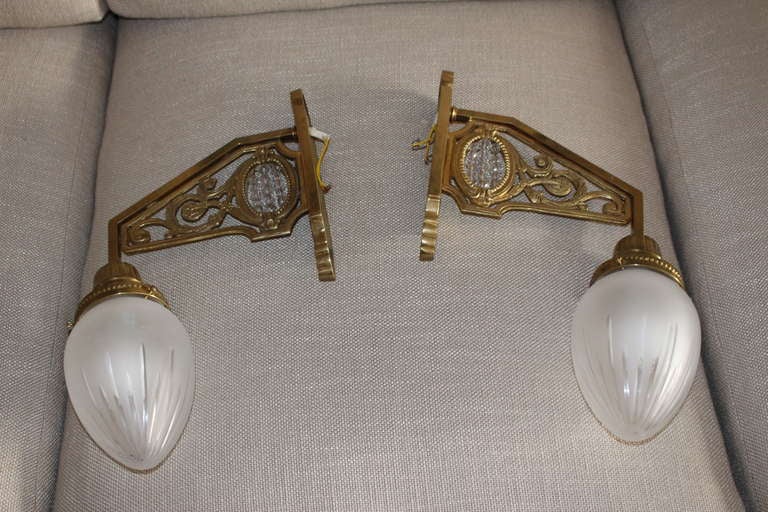 Pair of exceptional wall sconces, crystal glass shades.