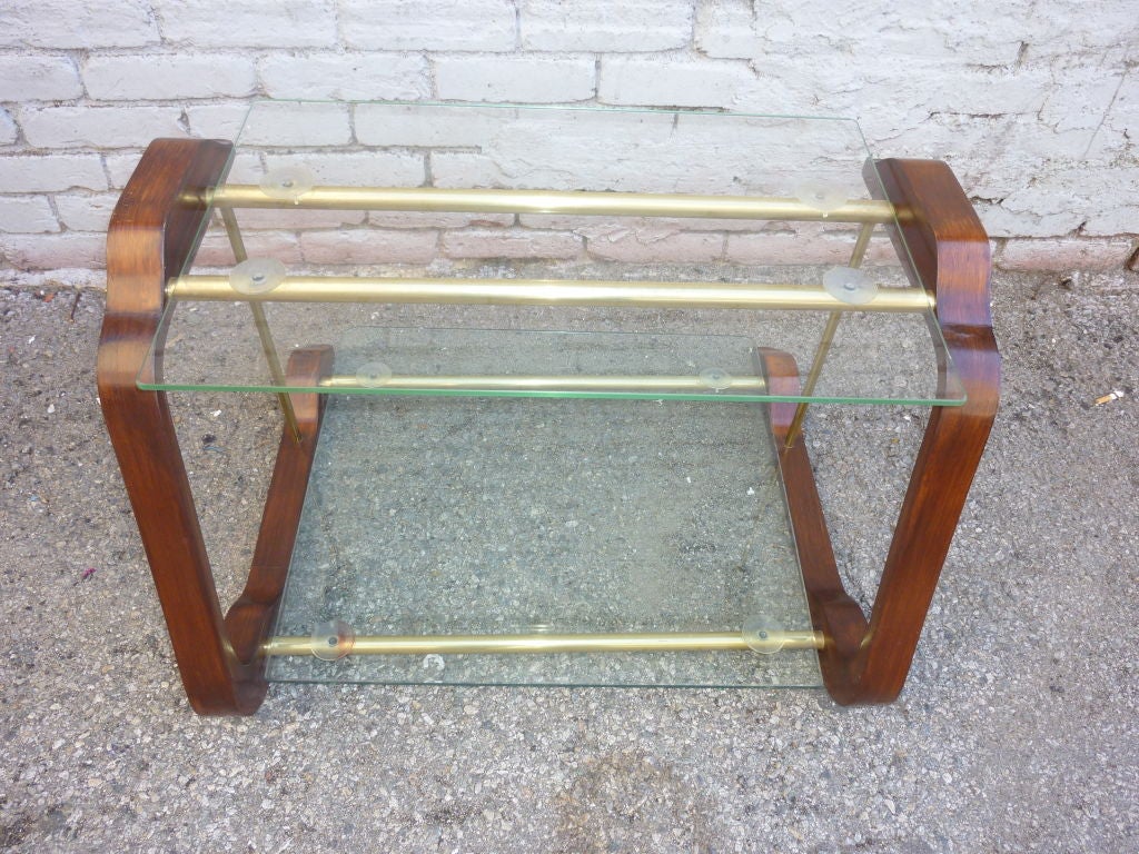 Brass and wood base table .Bottom glass is bigger  then the upper glass
Pls note: Item is located at Beverly Store
7274 Beverly Blvd 
Los Angeles, CA 90036
