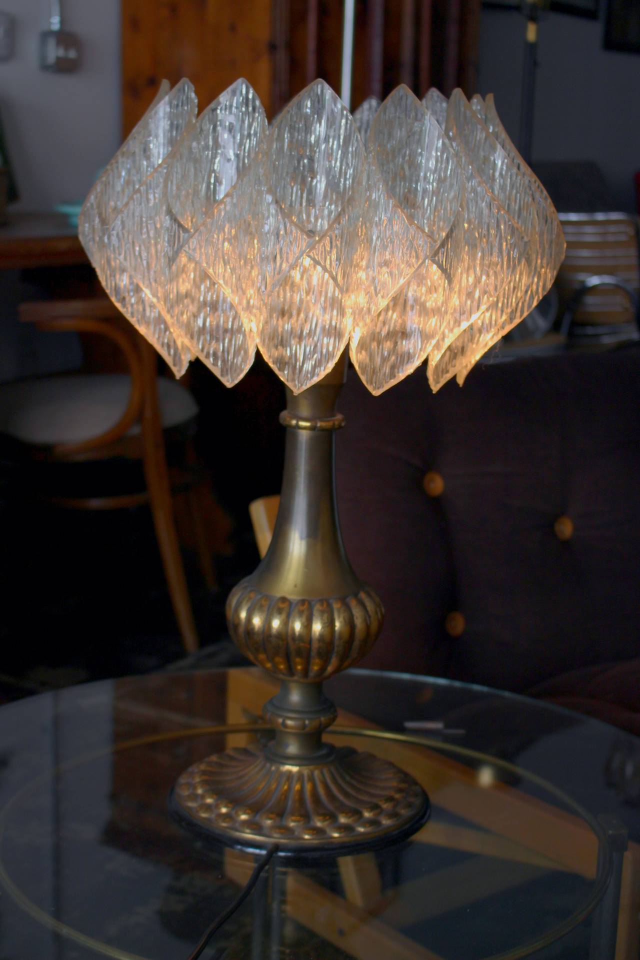 German brass table lamp, plexiglass shades and brass base.


