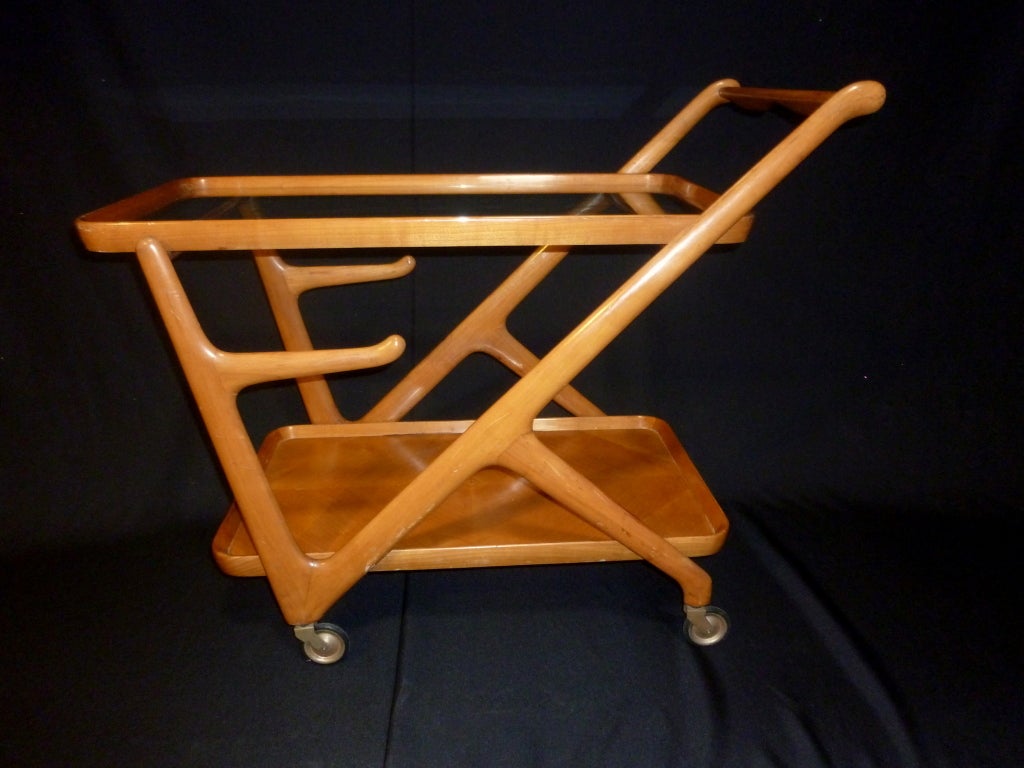 Original finish on 20th century Italian walnut glass bar cart with  removable glass tray.