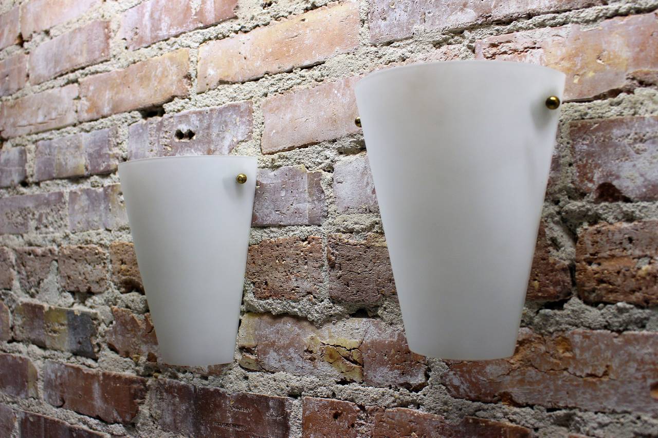 Wall sconces in style of Stilnovo.