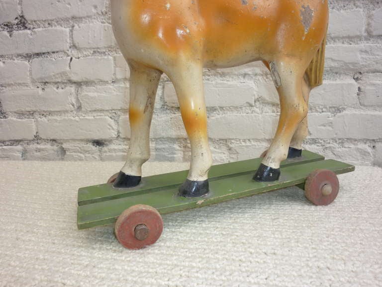antique horse on wheels