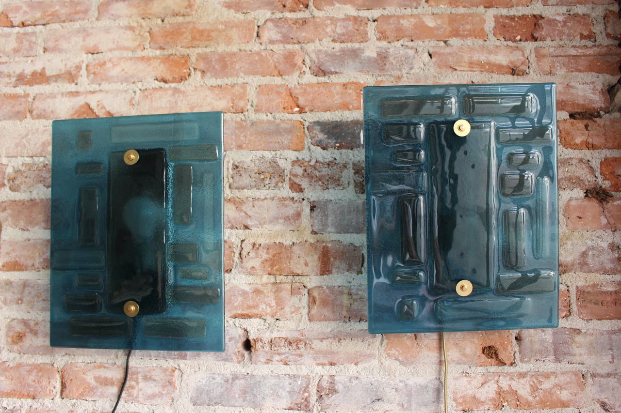Austrian large glass sconces, rewired blue, fume glass with brass hardware in the front.Wall sconces are same dimensions just the photos are distorted.
 14.5 Height and 11.5 WIdth