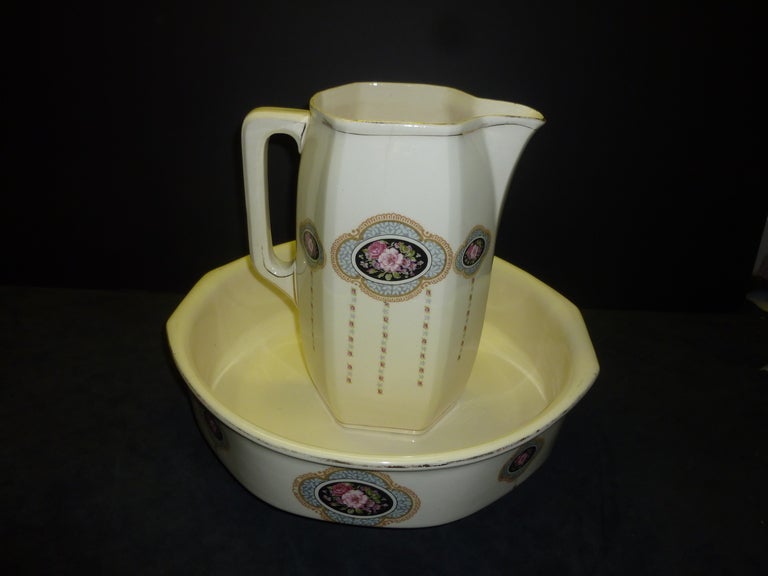 Antique white color set of the washing bowl and pitcher .This is a gorgeous Art Deco set . Set is marked  on the bottom .Pitcher measurement : H:12 inch ; L:9.5 ;D 6 