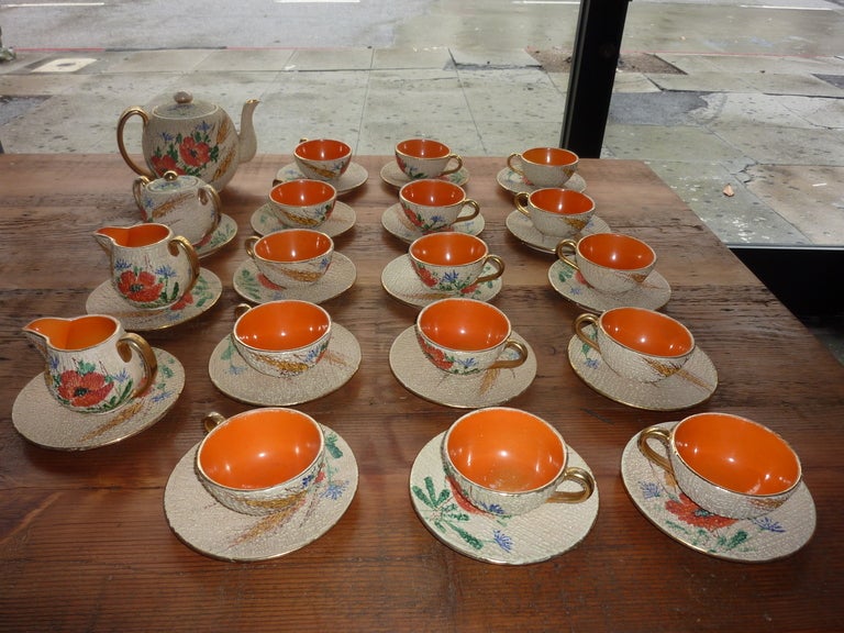 Pottery with the Japanese motive 38 pieces serves 15 persons
sign Fatci. One of the tea cup has a small fracture still hold liquid.