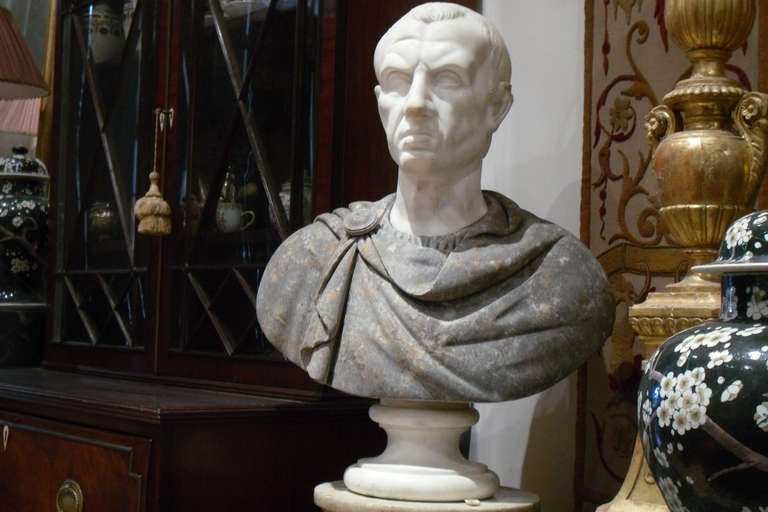 A 19th century Grey and White marble bust of a Roman Emperor.