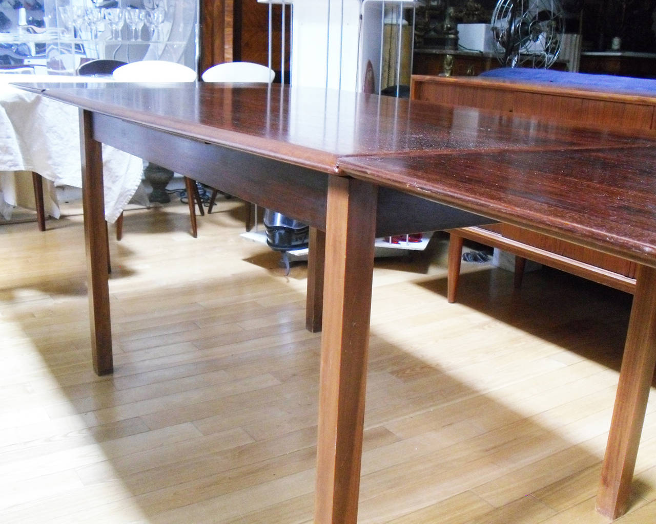 European Mid-Century Modern Rosewood Extendable Dining Table For Sale