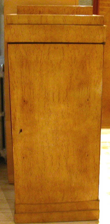 A Biedermeir Birch Pedestal Cabinet