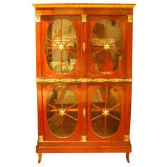 An Austrian Neoclassic Parcel-gilt Mahogany Bookcase