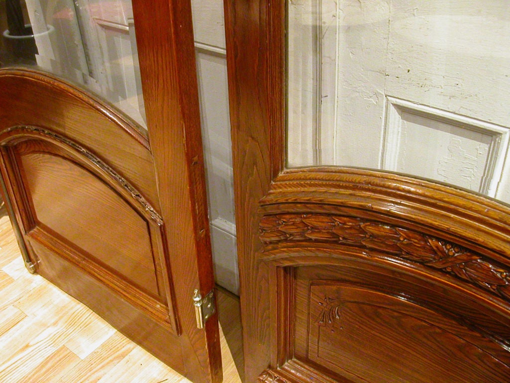 Pair Of Brass-mounted Oak Doors For Sale 4