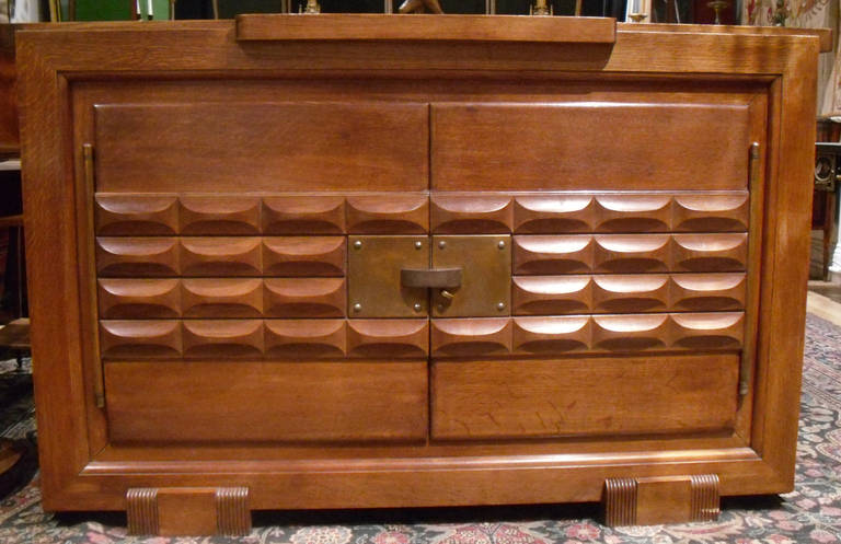 A French solid oak sideboard with brass fitting.