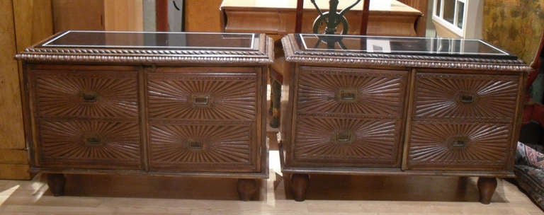 A pair of 19th Century South Asia carved hard wood double door cabinets inset with marble tops.