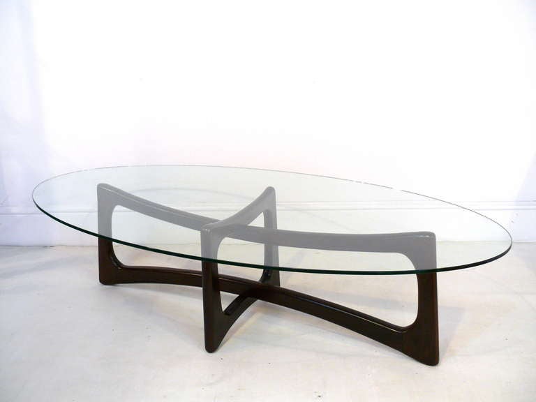 Bowtie coffee table by Adrian Pearsall @1960's.  Newly refinished in a deep espresso and shown with an oval glass top.